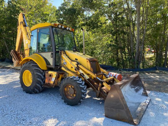 2003-New-Holland-110B-Enclosed-4x4-Backhoe-Front-Loader-Plow-Machine